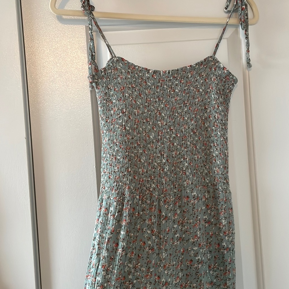 Super cute romper with flare bottom Size M
